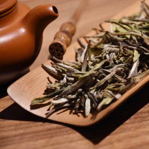 Duonaŭtomata pesila plenmaŝino por tefolioj